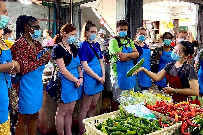 6-Hour Akha Tribe Culture and Cooking Class in Chiang Mai - Evening class setup: outdoor kitchen energy with AC when you eat