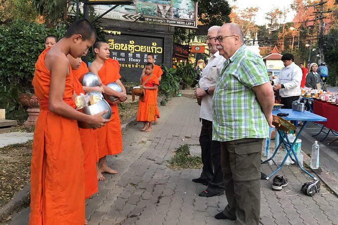 Alms and Wat Phra That Doi Suthep Private Chiang Mai Tour - Walking Through Chiang Mai Streets and Warorot Market