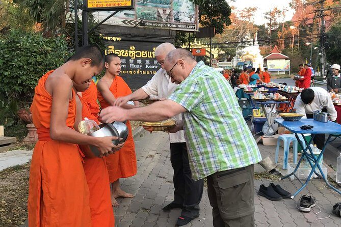 Alms and Wat Phra That Doi Suthep Private Chiang Mai Tour - Wat Phra That Doi Suthep: Cable Car Views and Temple Etiquette