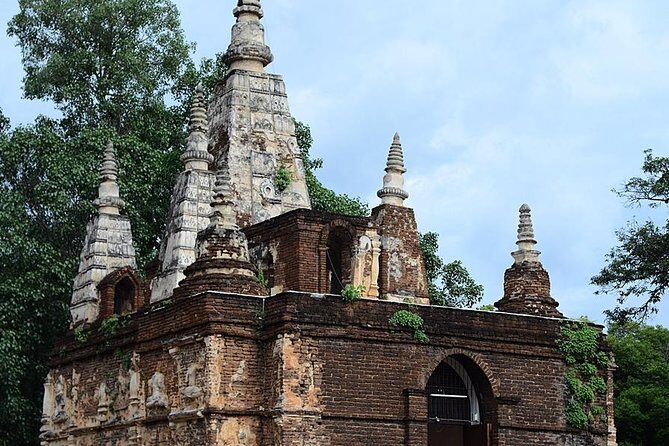 Best of Chiangmai day trip Temples and Sticky waterfall - Wat Chiang Man: the oldest temple in town and a chedi with elephant buttresses