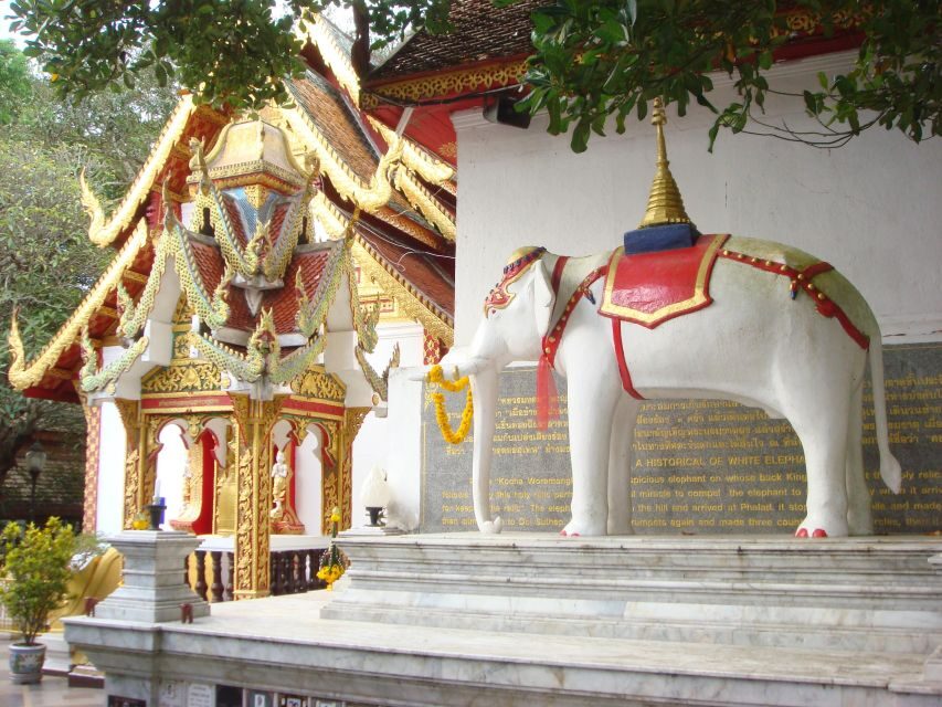 Chiang Mai: Doi Suthep and Hmong Village Half-Day Tour - Hmong Village Visit: Culture, Crafts, and Real-Life Details
