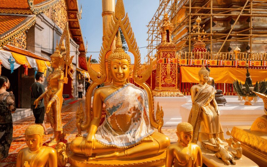 Chiang Mai: Doi Suthep Temple and Waterfall by Songtaew Trio - Wat Phra That Doi Suthep: climbing in switchbacks and seeing the holy relic