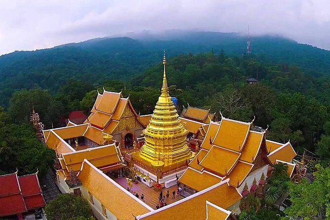 Doi Suthep and Hmong Hilltribe Half Day Tour in Chiang Mai - Wat Phra That Doi Suthep: 300 steps, 360-degree payoff