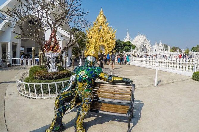 From Chiang Mai: White and Blue Temple & Golden Triangle Day Trip - Mekong boat time: a calmer break from temple crowds