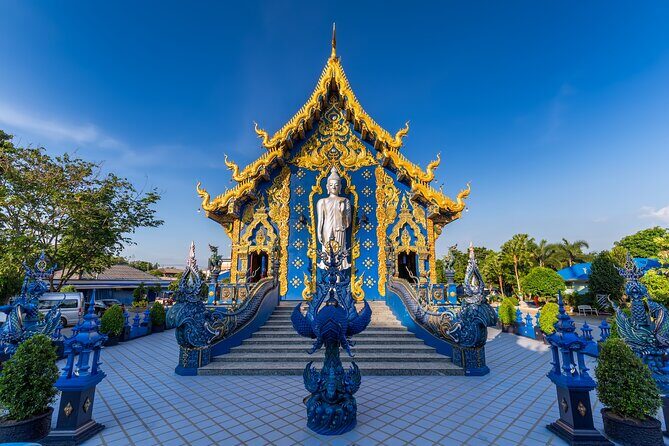 Full Day Chiang Rai 3 Temples White, Blue,Big Bhudha Temples - Wat Huay Pla Kang (Big Buddha / Red Temple): Guan Yin climb and panoramic views
