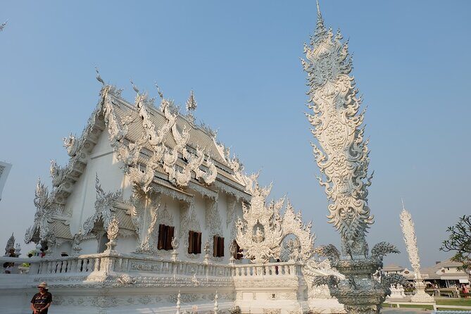 Golden Triangle, White, Black, Blue Temple Full Day Tour From Chiang Mai - Wat Rong Khun White Temple: Dress Code and Photo Magic