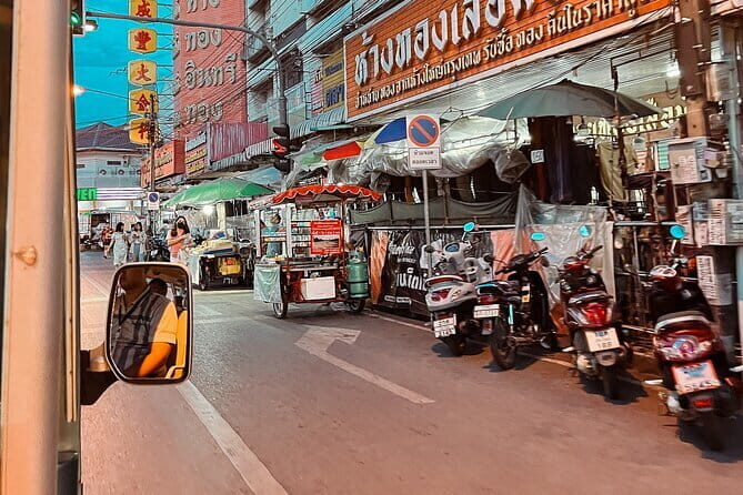 Guided Chiang Mai City Night Tour by EV Tram - Chiang Mai Gate Night Market: Street Food Focus with Included Admission