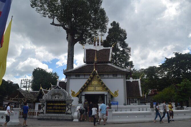 Half Day Chiang Mai City and Cultural by TukTuk, Samlor & Red car (Private Tour) - Wat Phan Tao: teak temple details you can actually notice