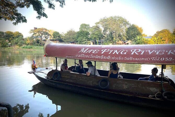 Half Day Private Chiang Mai Trishaw Ride and Mae Ping River Cruise - Warorot Market (Kad Luang): flowers, garlands, and lotus folding for temples