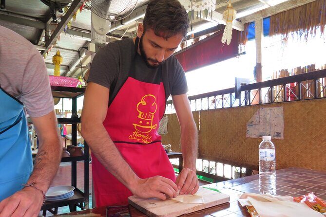 Half-Day Thai Cooking Class and Market Tour From Chiang Mai - The Open-Air Kitchen in a Private House: Your Hands-On Moment