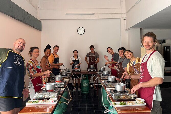 Lanna Smile Thai Cooking Class in Chiang Mai with Market tour - Inside Lanna Smile’s AC studio with Nim and Pim