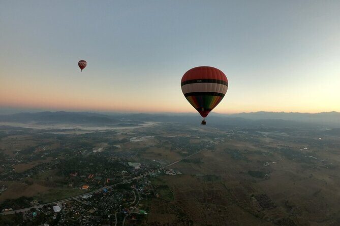 Sunrise Hot Air Balloon Adventure in Chiang Mai - Landing Moment: Champagne Pop and the Completion Certificate