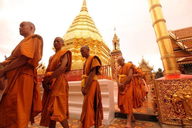 Wat Umong and Doi Suthep Temples Evening Tour - Doi Suthep at sunset: 309 steps and that view over Chiang Mai