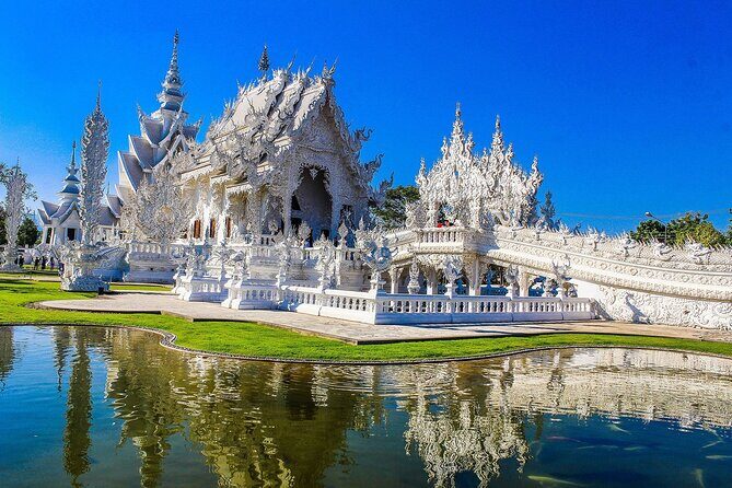 White, Red/Black and Blue Temples Full Day Trip From Chiang Mai - Wat Rong Seur Ten (Blue Temple) and Wat Huay Pla Kang: modern design, big visuals